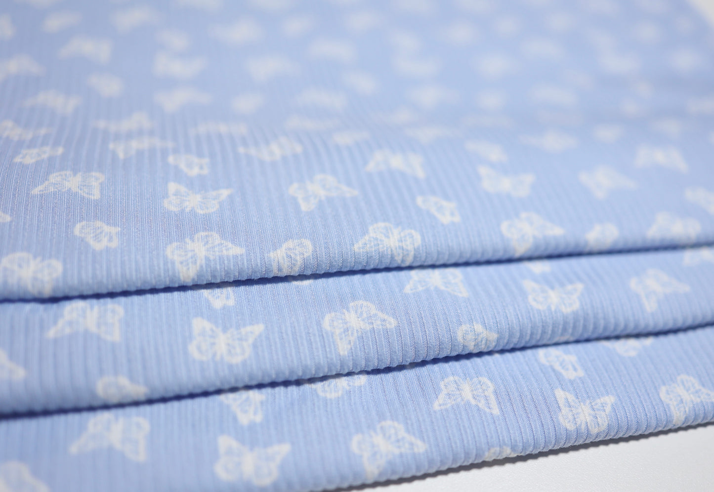(Rib) Small Butterfly on Blue