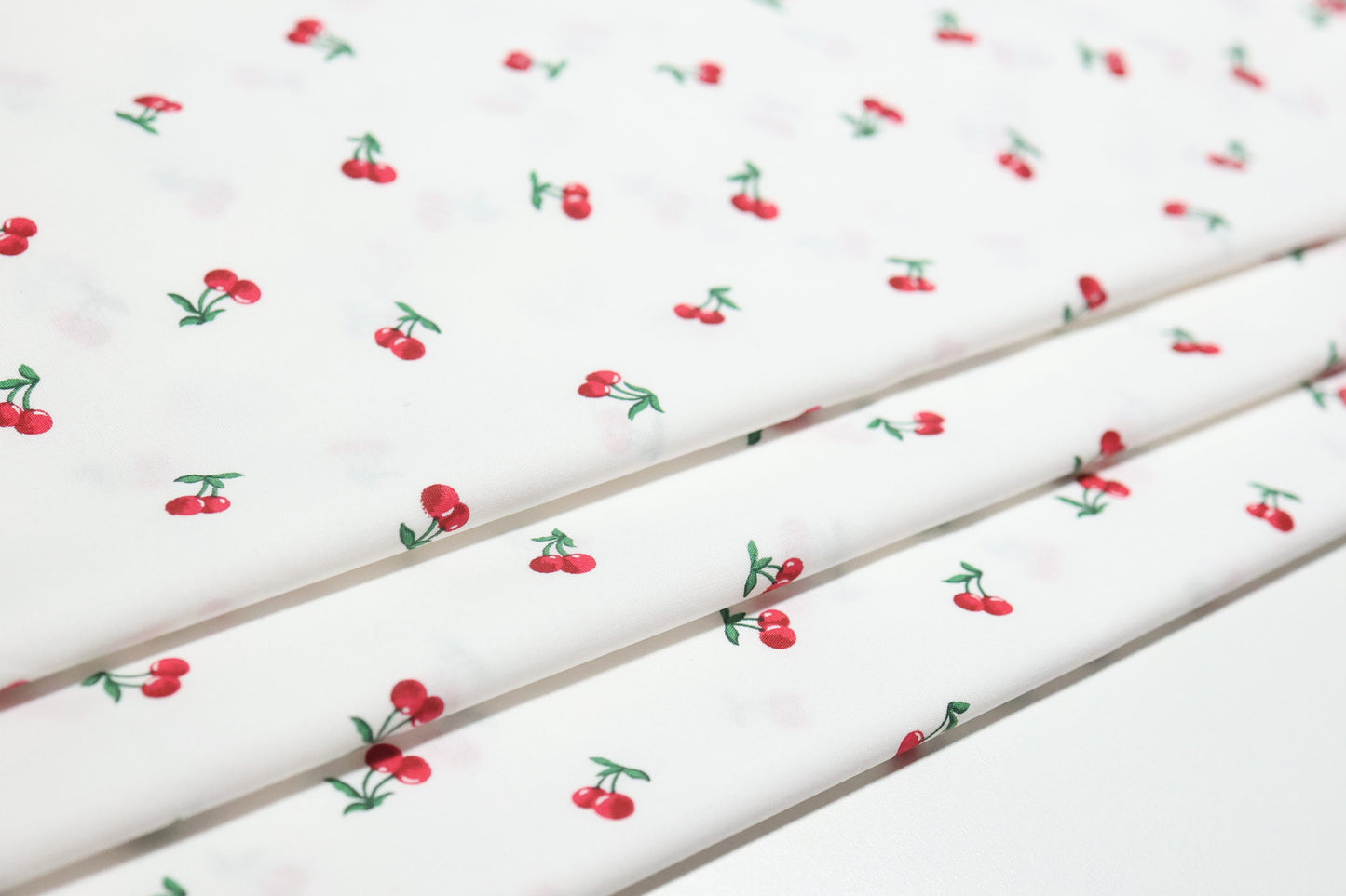 (Cotton Span) Red Cherries On White